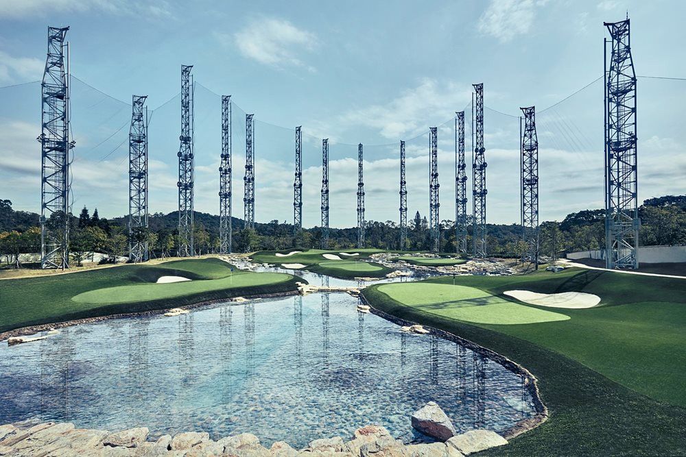 Albuquerque Synthetic grass golf course with water and tall metal towers