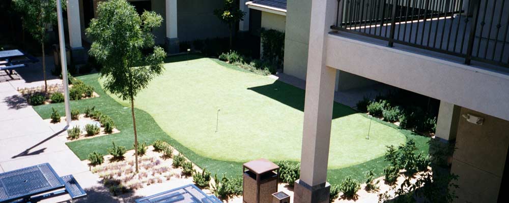 Putting tee in Albuquerque commercial complex courtyard
